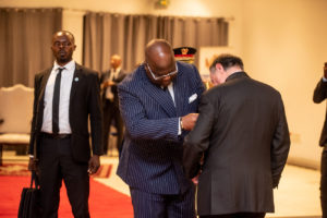 President Tshisekedi awards an honorary decoration to George A. Forrest